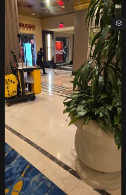 Floor cleaning in lobby of commercial building.